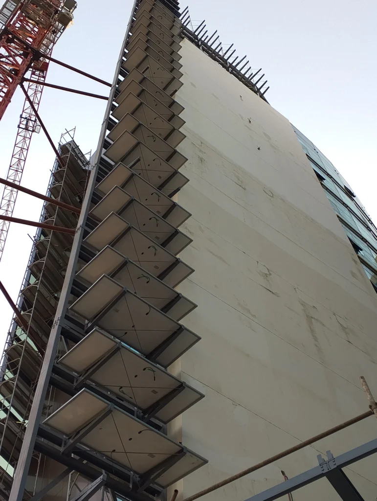 Panels built into the facade of the Afreximbank tower under construction