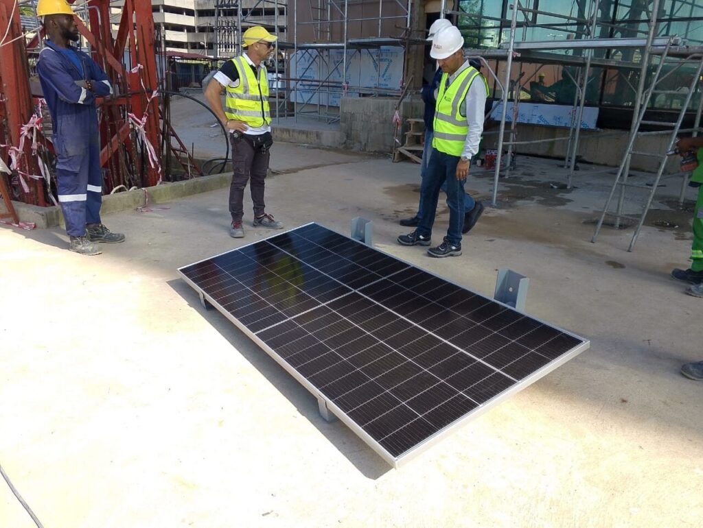 Crew with a solar module on the working deck