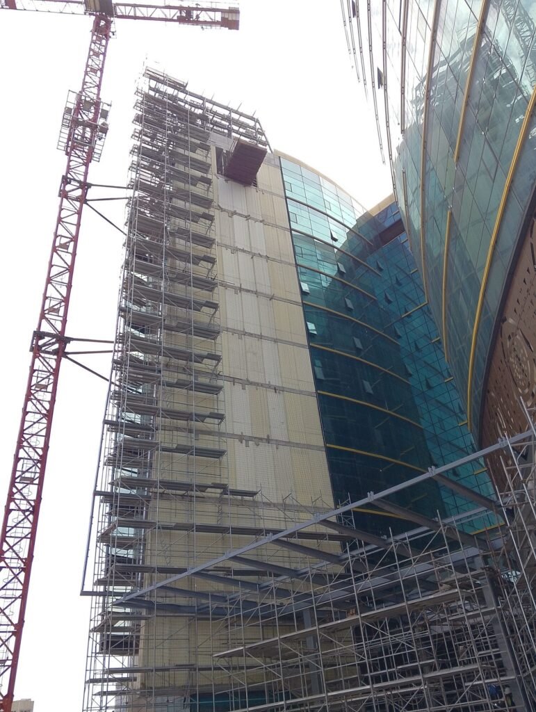 Tower under construction with a crane, before the facade array goes on