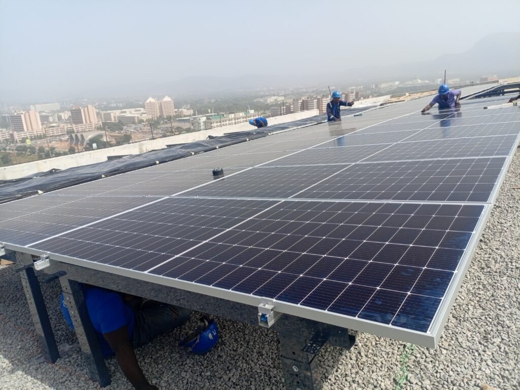Solar panels fixed to tilt frames on the rooftop array