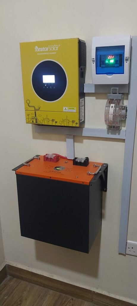 Inverter with changeover switch and a wall-mounted battery enclosure